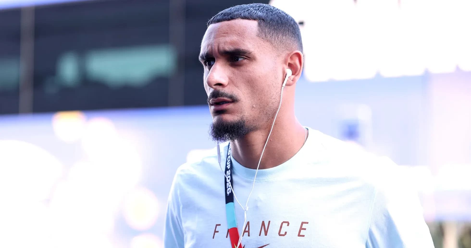 Athlete wearing headphones before an event