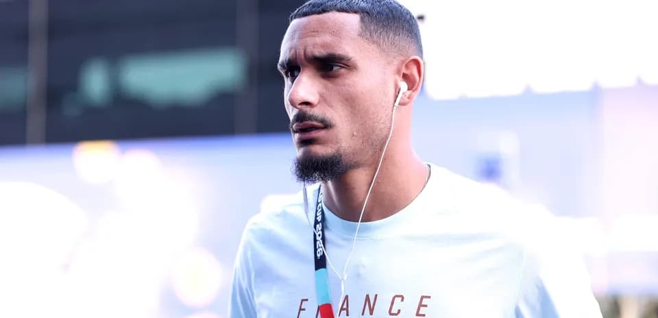 Athlete wearing headphones before an event