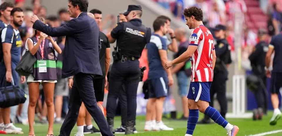 Atletico Madrid player leaving the pitch after match