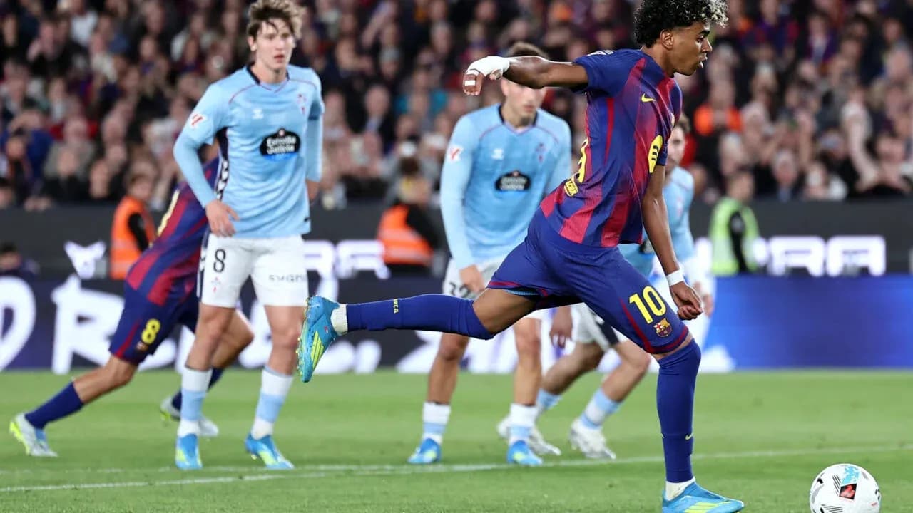 Barcelona player taking a penalty kick during match