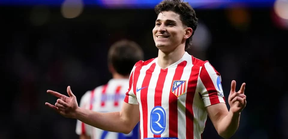 Atletico Madrid player celebrating a goal on field