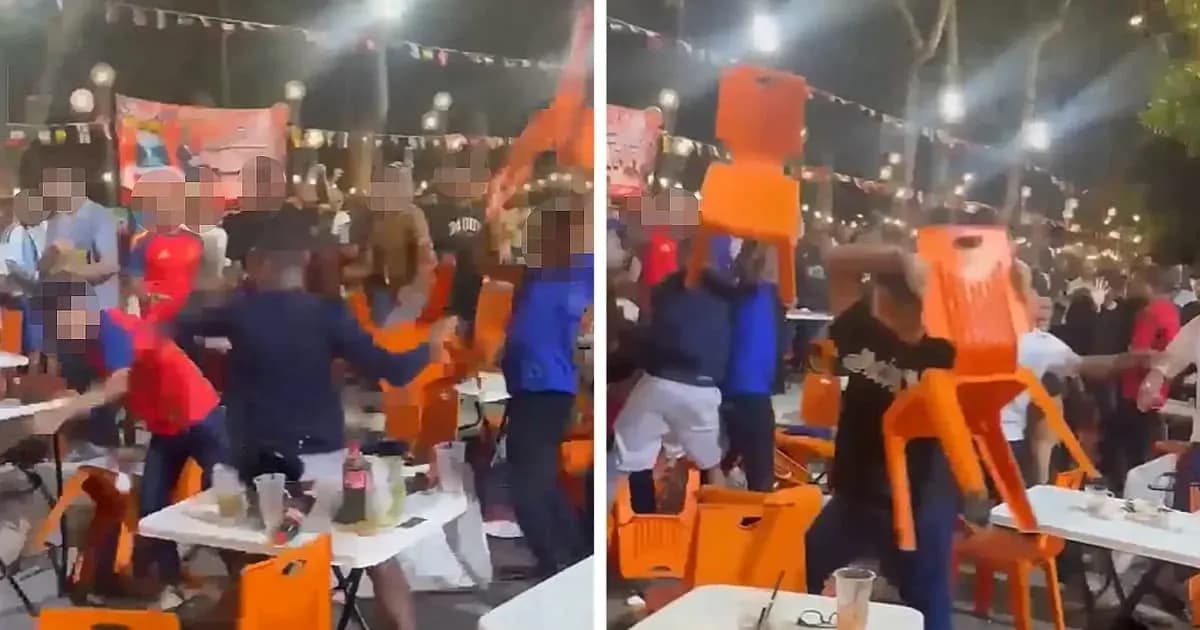 Crowd throwing chairs in a lively gathering