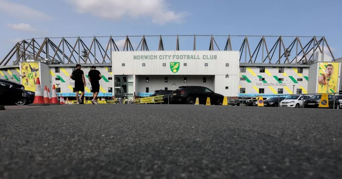 Norwich City Football Club entrance with fans arriving