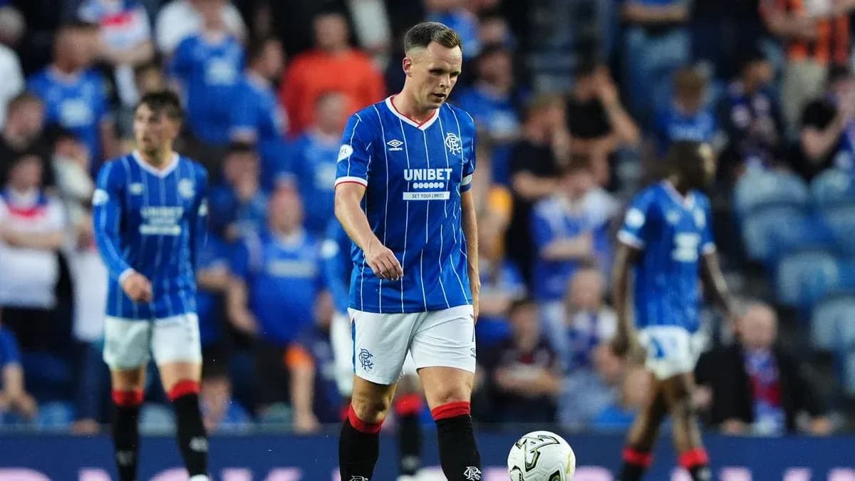 Rangers player walking on the pitch during match