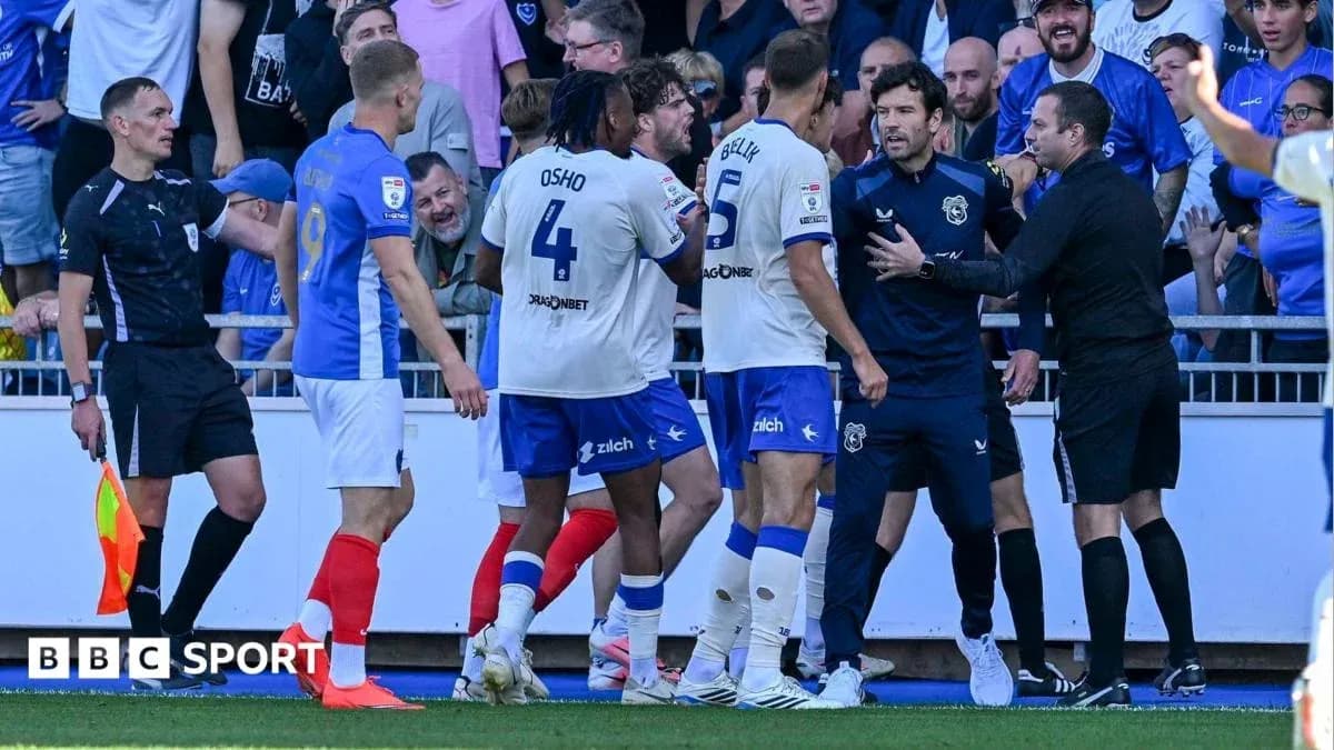 Players and officials arguing during a match