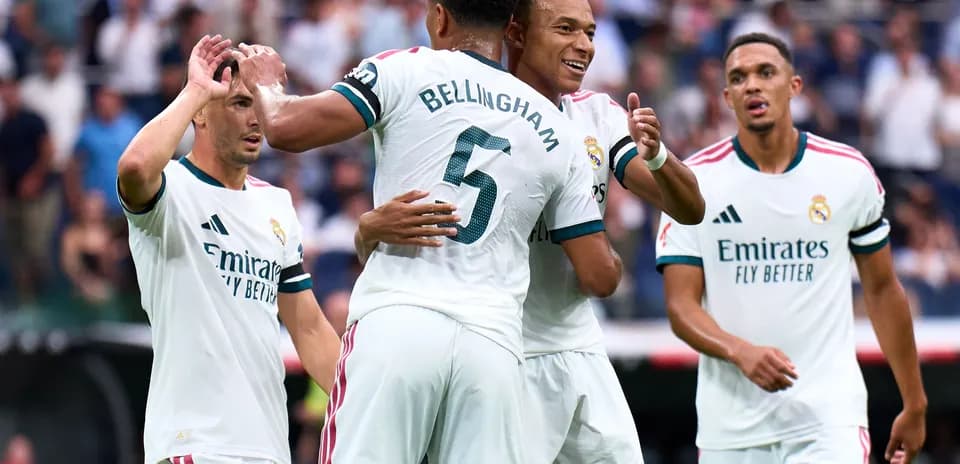 Real Madrid players celebrating a goal together