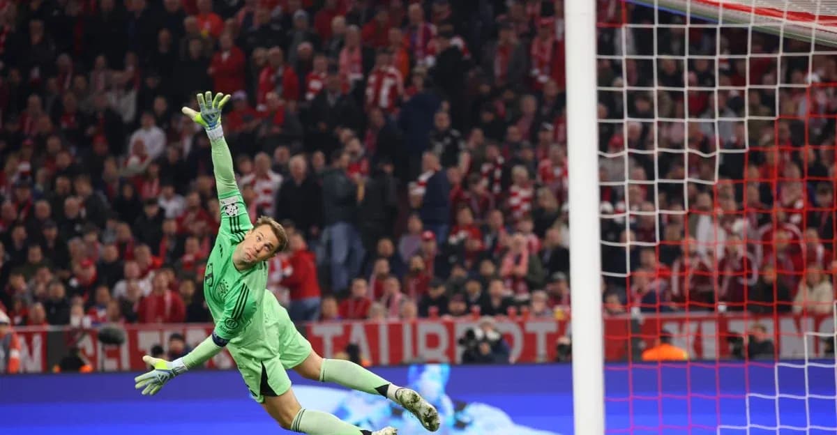 Goalkeeper diving to save a shot on goal