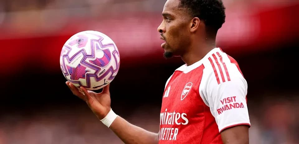 Player holding a soccer ball during match