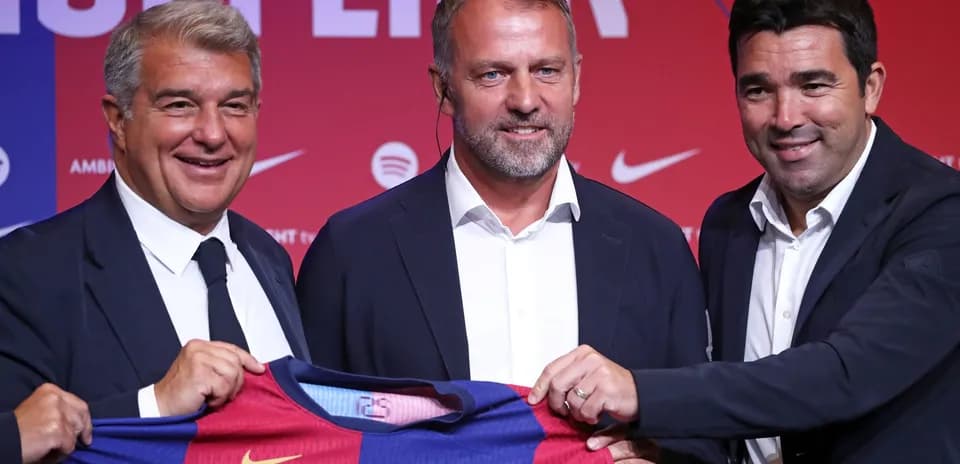 Officials presenting Barcelona jersey at press event
