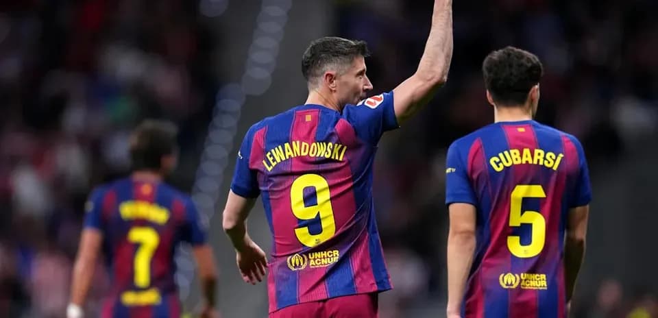 Lewandowski celebrating with teammates during match