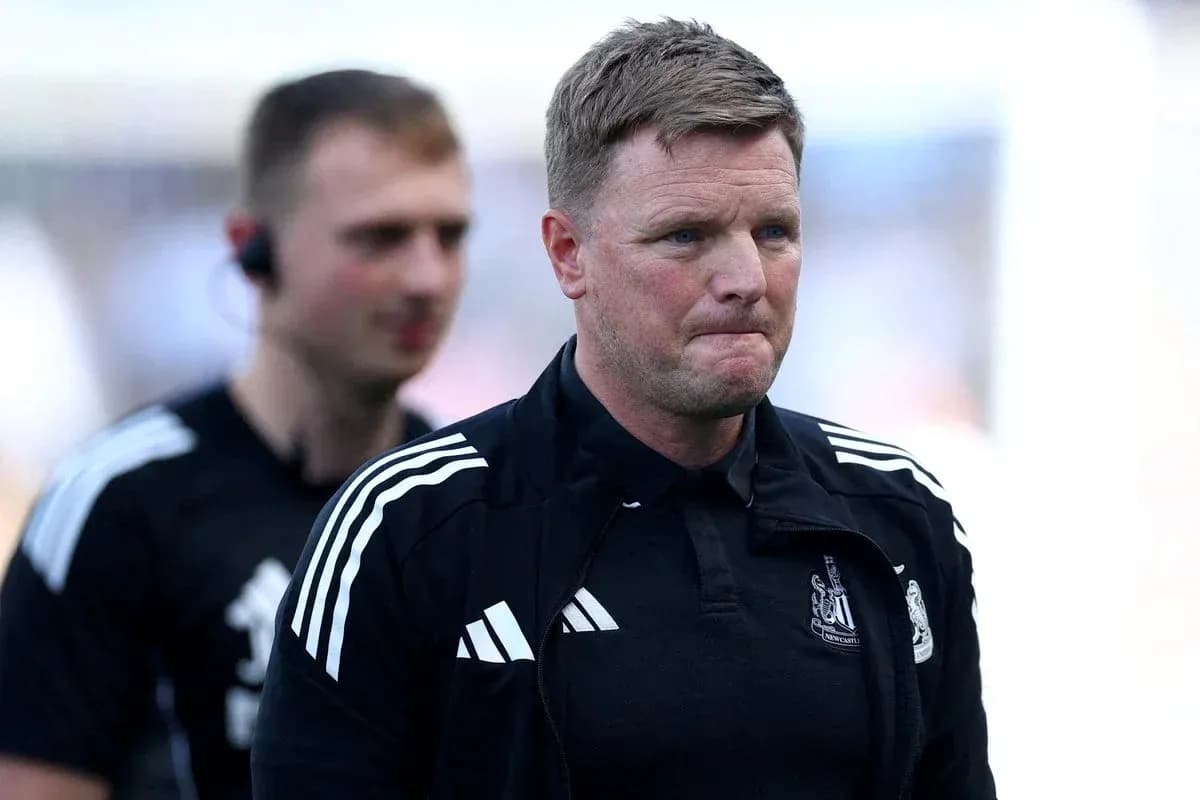 Newcastle United manager walking off the pitch