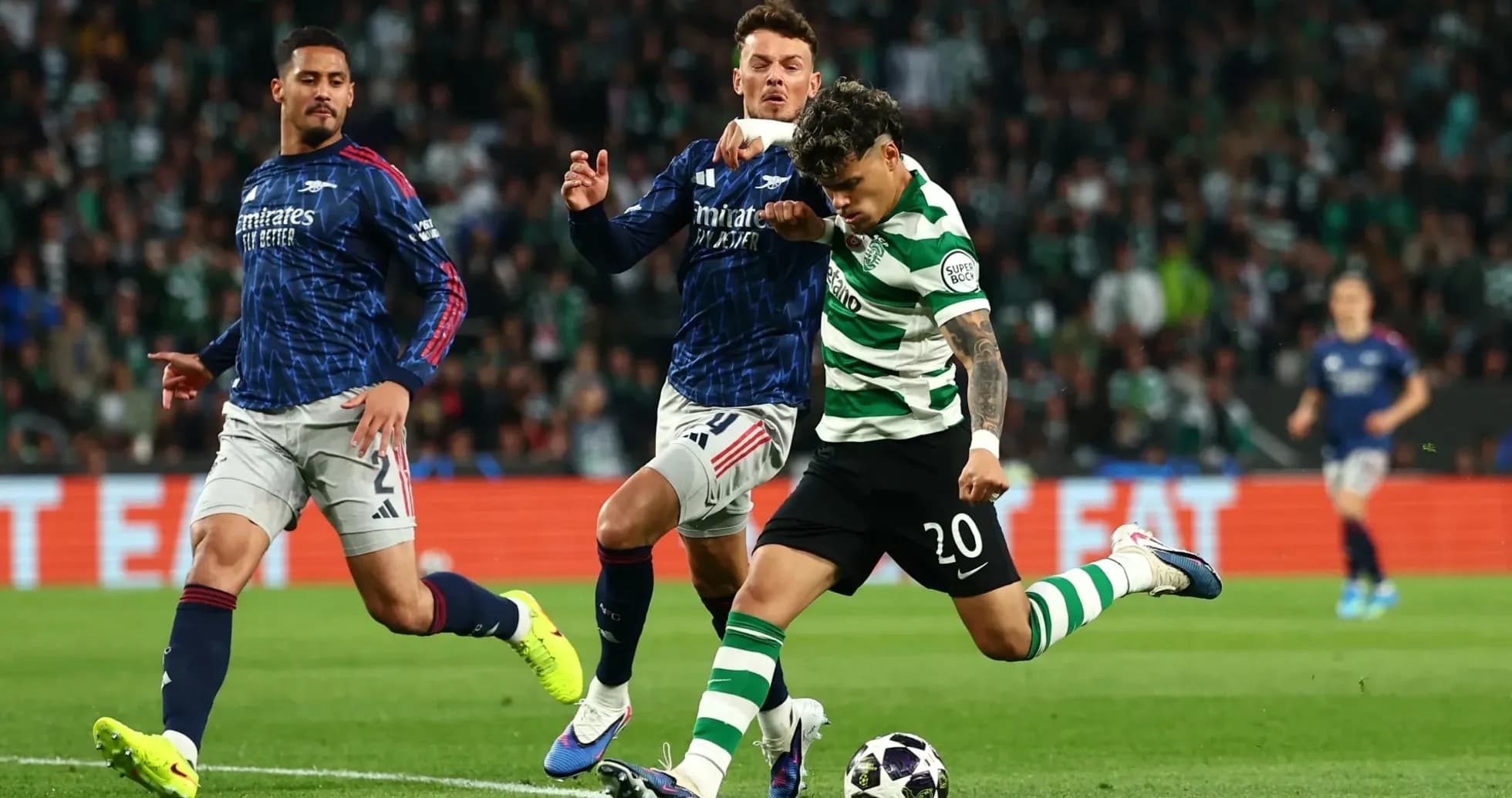 Celtic player shooting the ball during match action