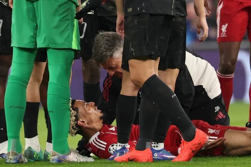 Player receiving medical attention on the field