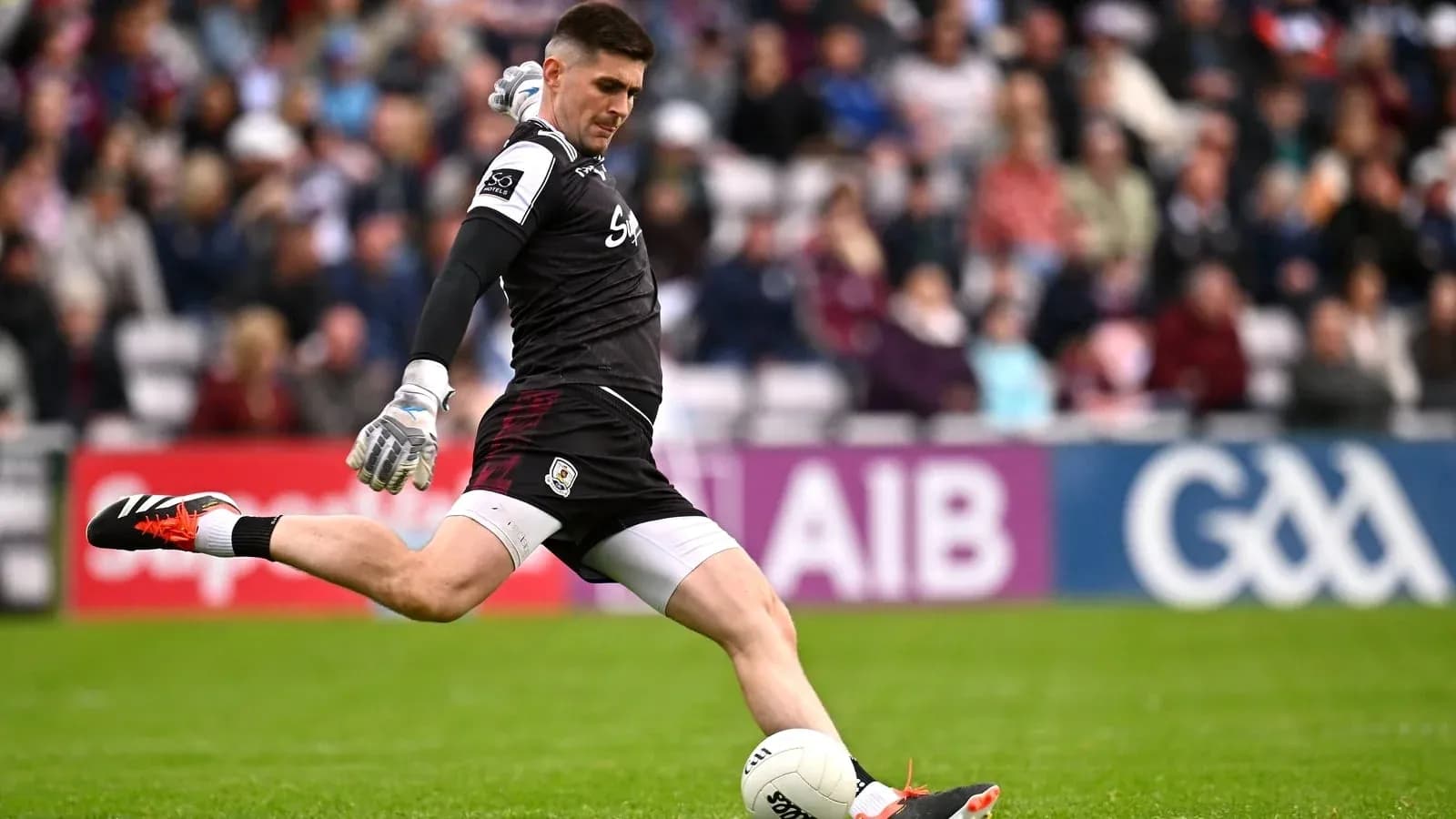 Goalkeeper kicking the ball during a match