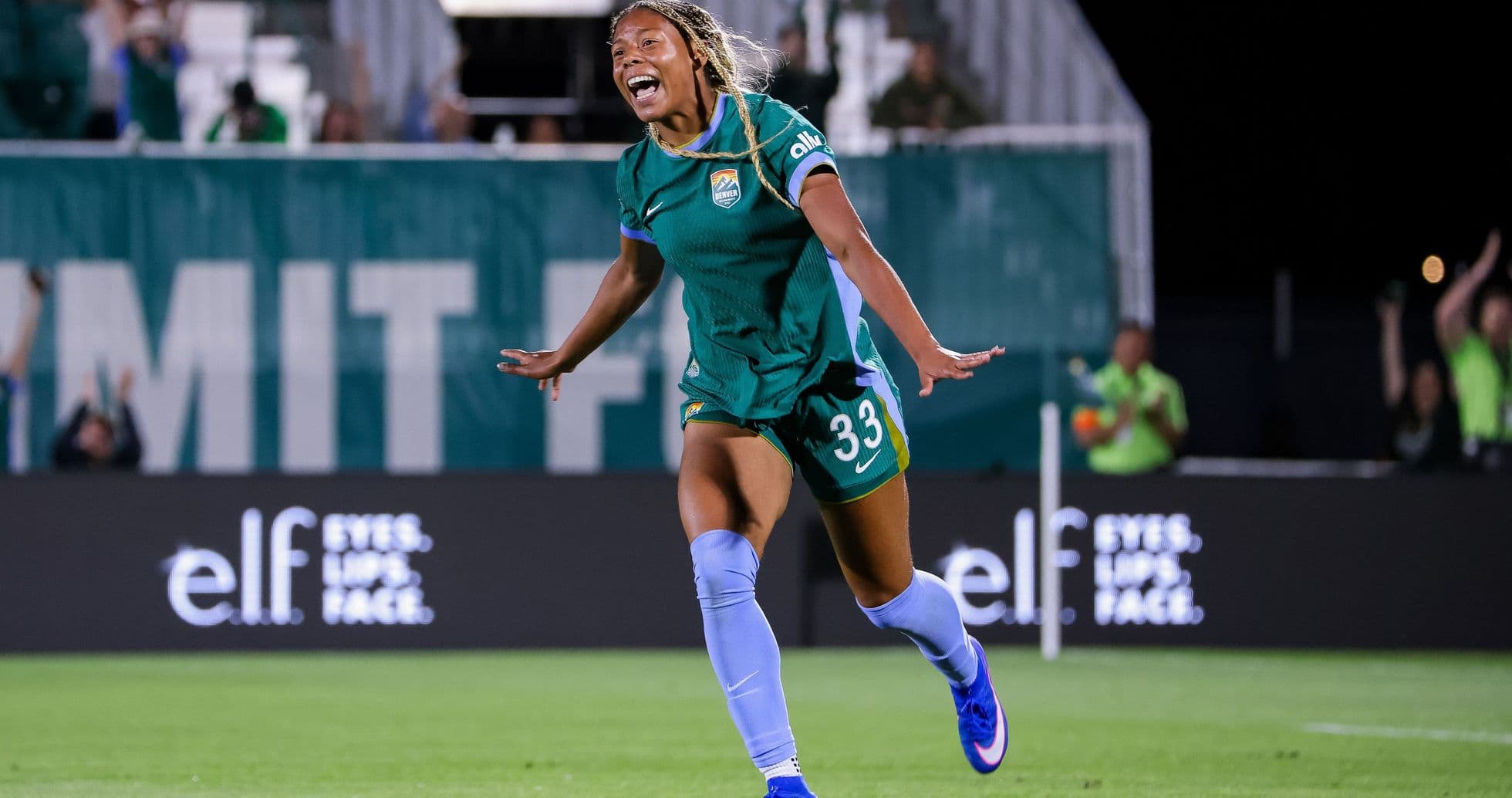 Player celebrating a goal during soccer match