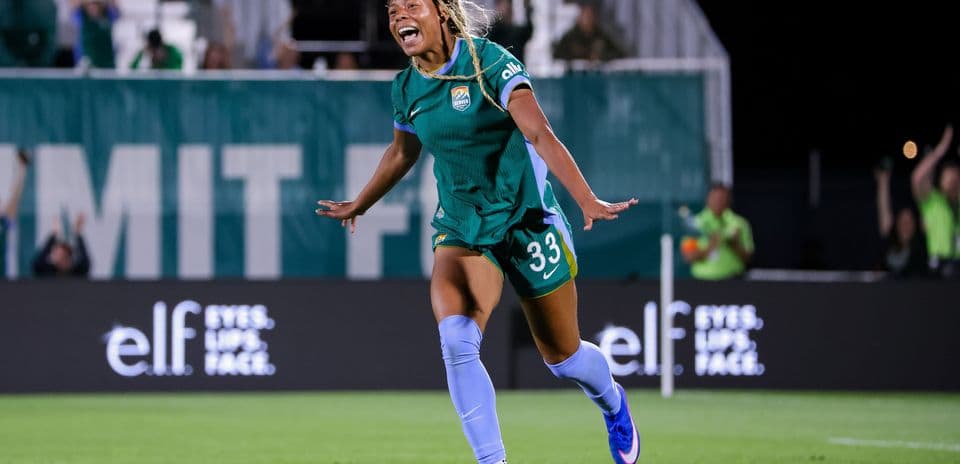 Player celebrating a goal during soccer match