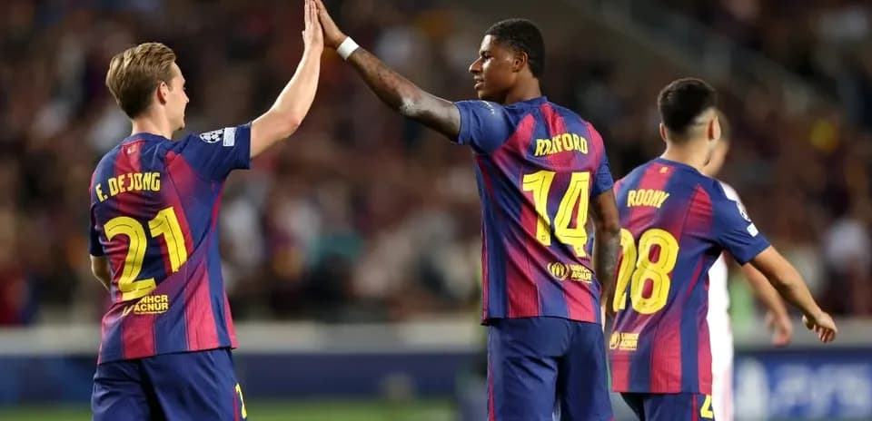 Frenkie de Jong and Marcus Rashford celebrating together