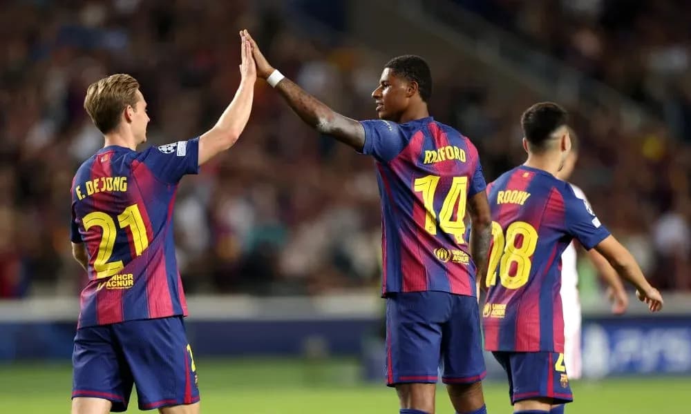 Frenkie de Jong and Marcus Rashford celebrating together