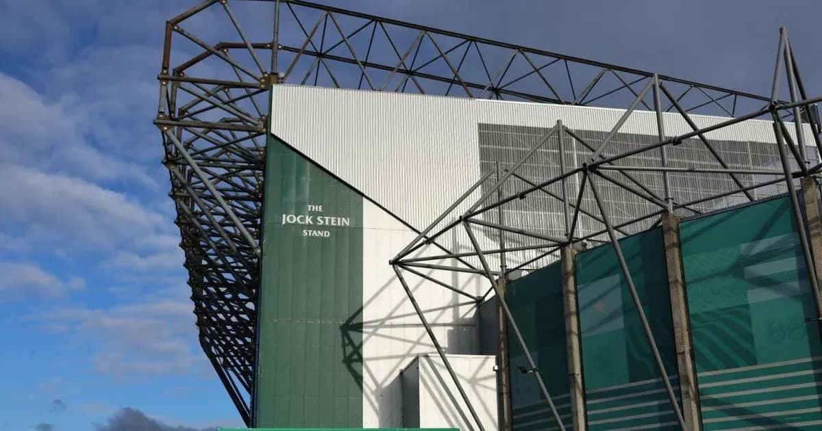 Jock Stein Stand of a stadium under cloudy sky