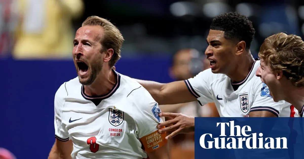 Harry Kane celebrating a goal with teammates