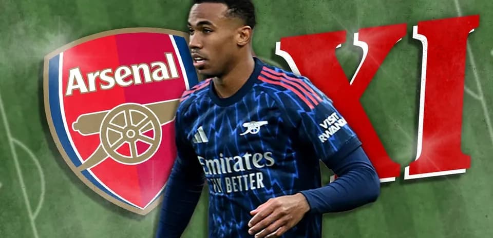 Arsenal player walking with club logo background