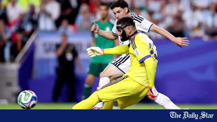 Goalkeeper in yellow diving to save the ball