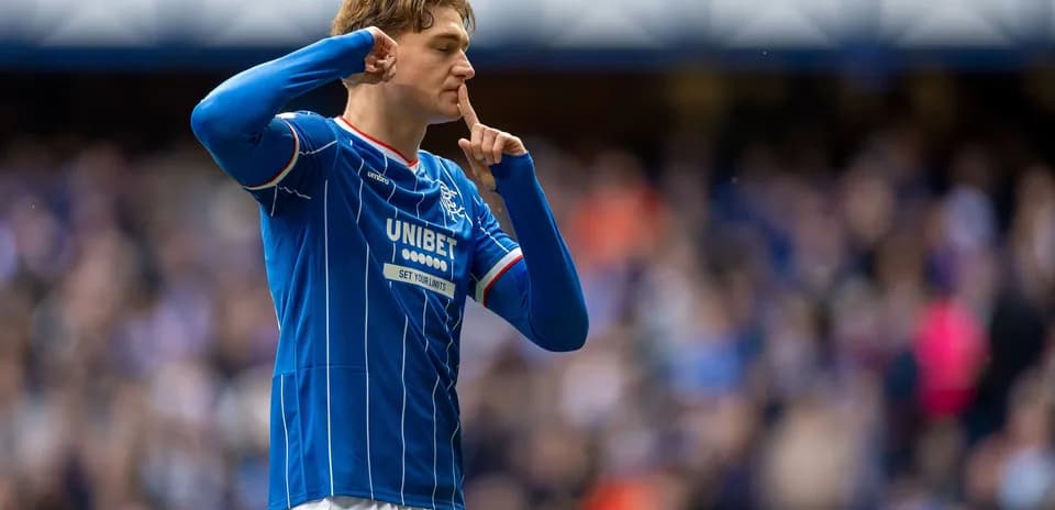 Rangers player shushing crowd after scoring goal