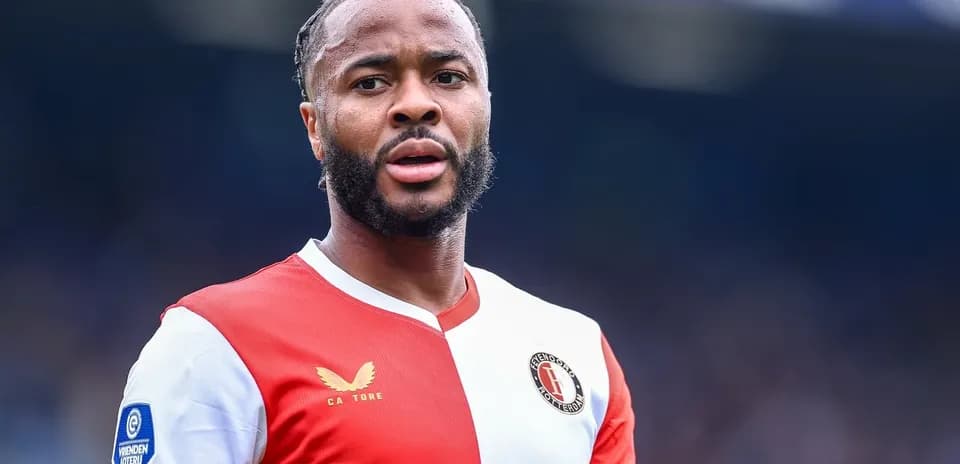 Feyenoord player in red and white jersey during match