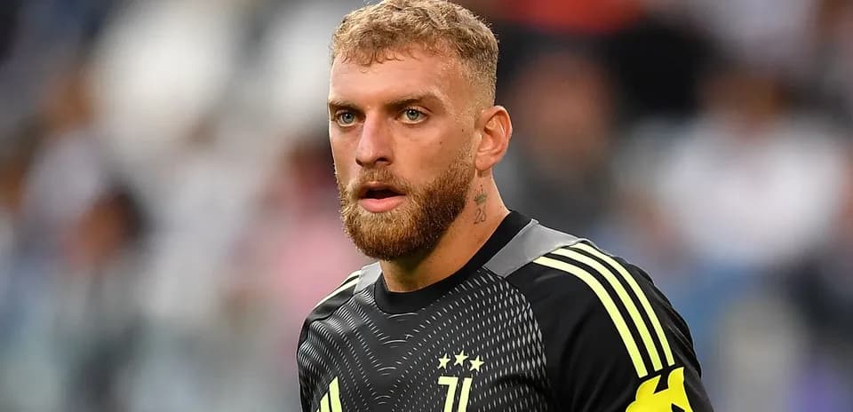 Goalkeeper in Juventus kit during a match