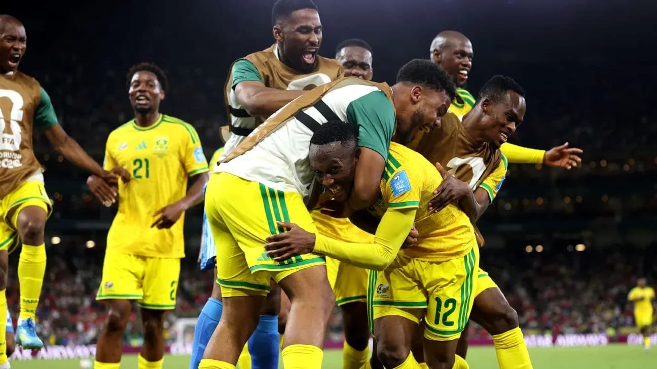 South African players celebrating a goal on the field
