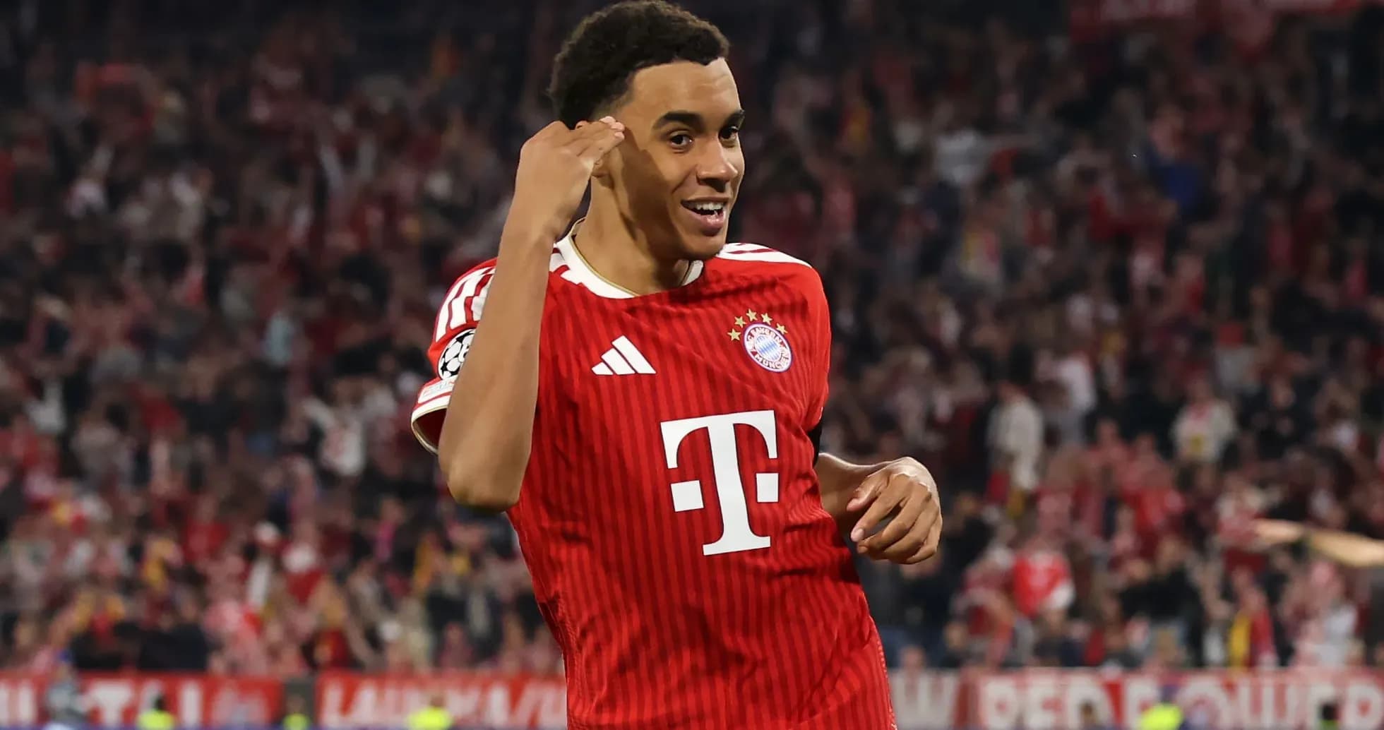 Bayern Munich player celebrating goal in stadium
