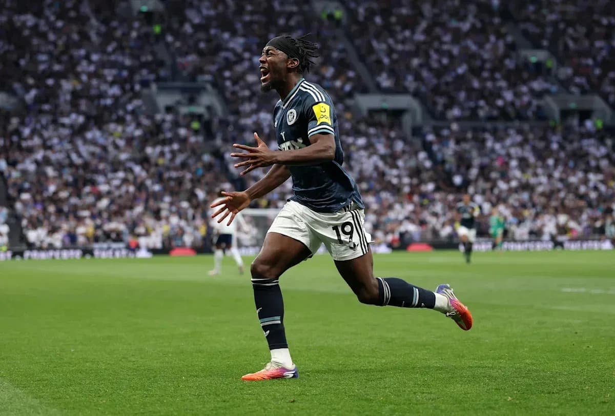 Player celebrating after scoring a goal during match