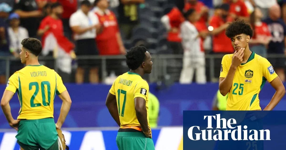 Australian players in yellow jerseys after match defeat