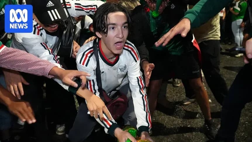 Fans celebrating with drinks during an event