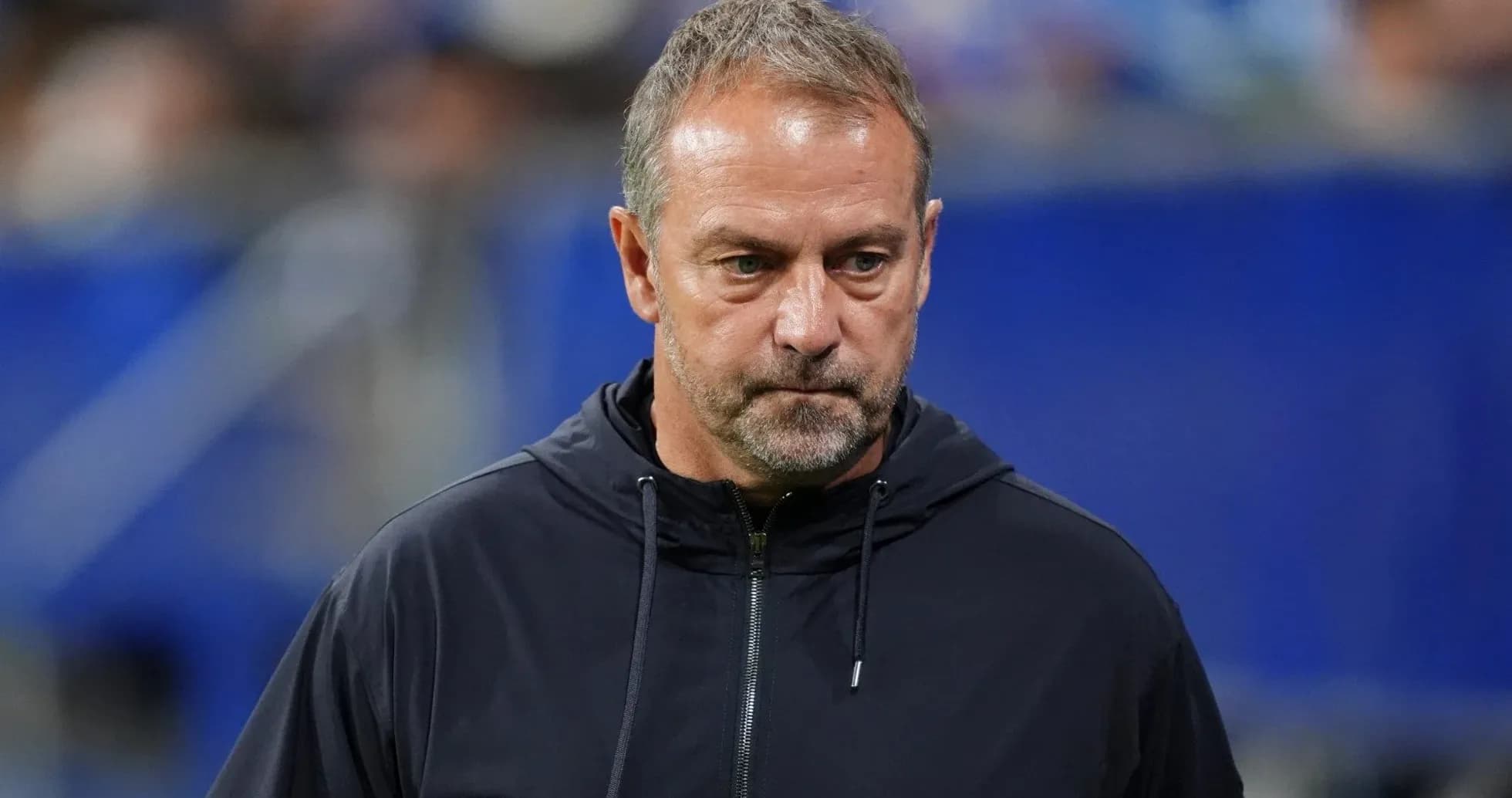 Football coach on the sidelines during a match