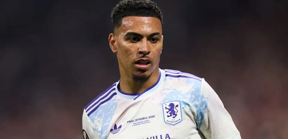 Aston Villa player in match action on field