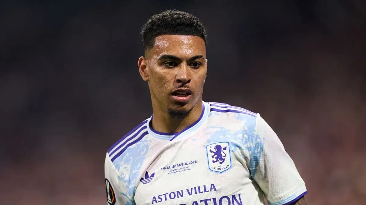 Aston Villa player in match action on field