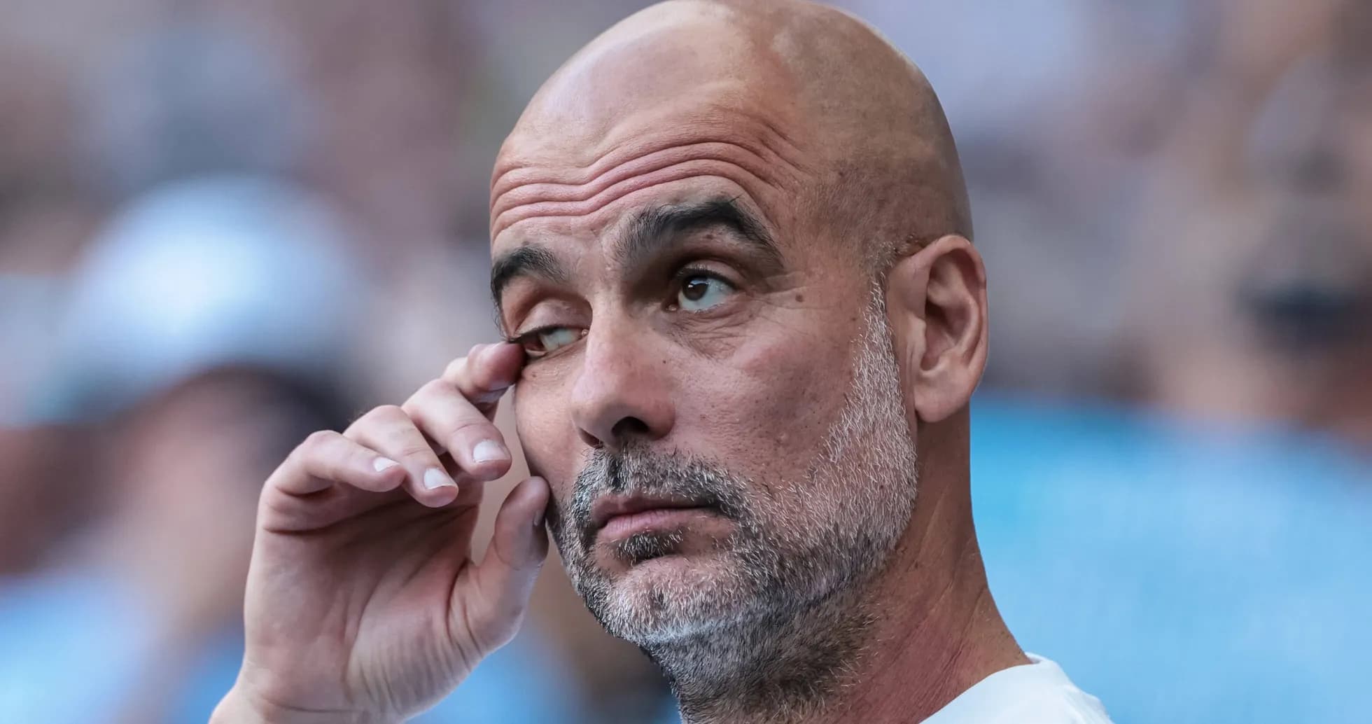 Coach adjusting his glasses during the match