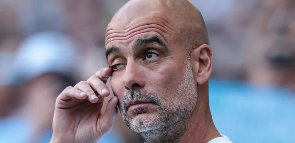 Coach adjusting his glasses during the match