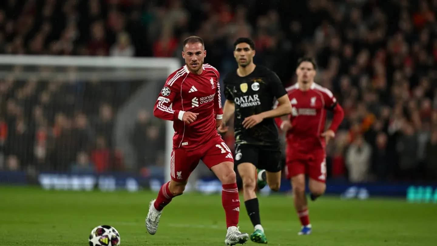 Liverpool player running with ball during match