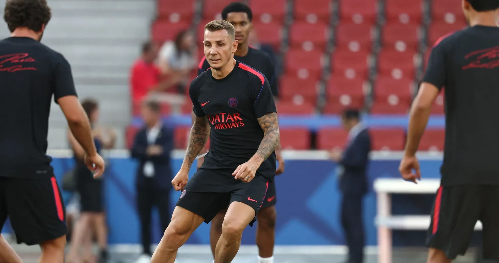 PSG players training on the pitch before match