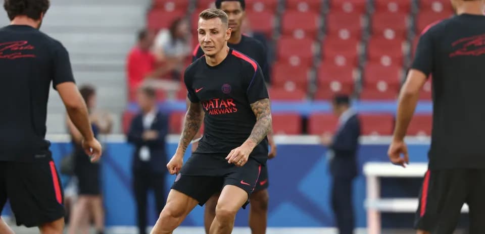 PSG players training on the pitch before match