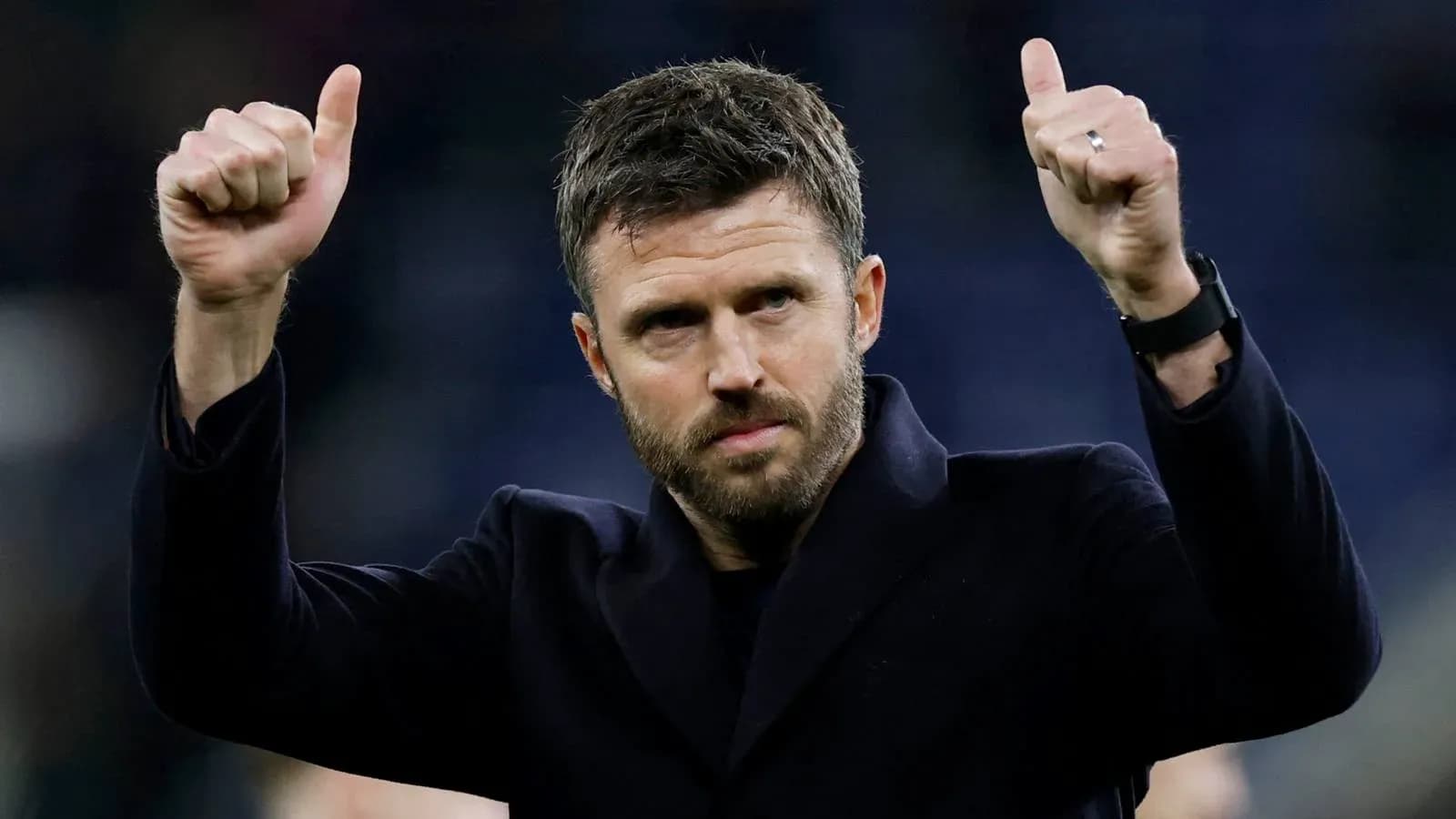 Coach giving thumbs up after match