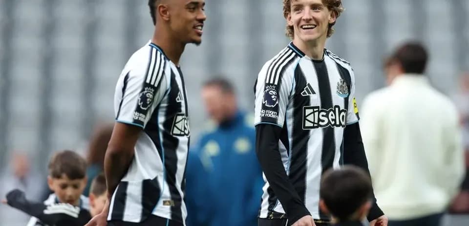 Newcastle United players interacting during warm-up