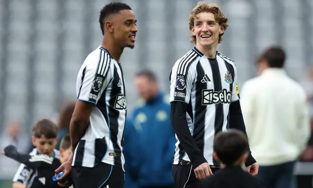 Newcastle United players interacting during warm-up