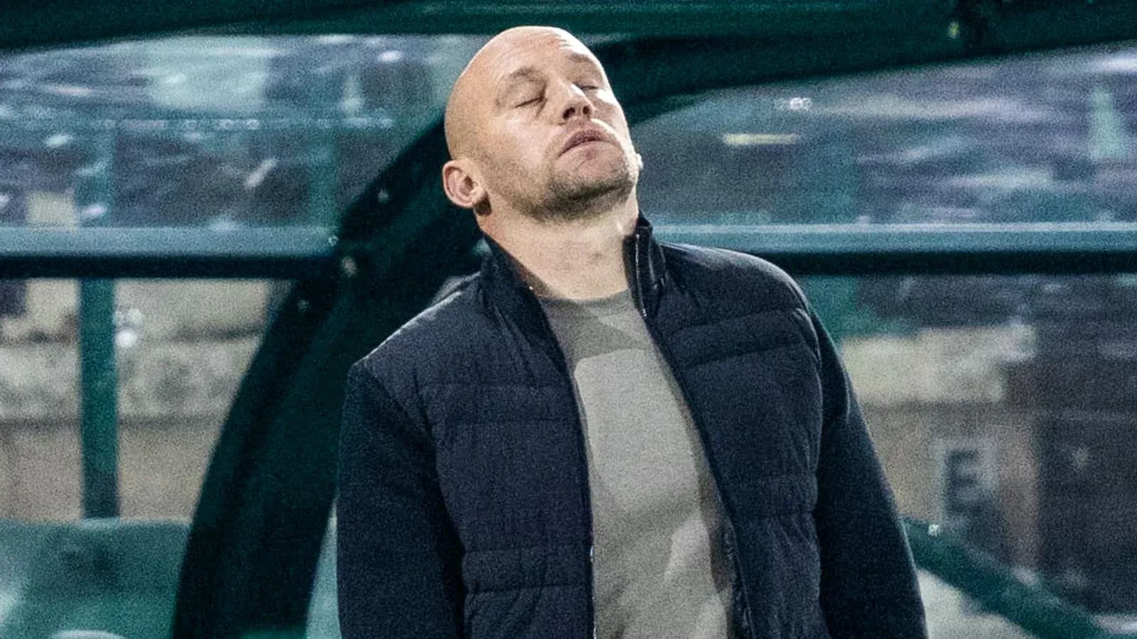 Coach observing the game from the sidelines