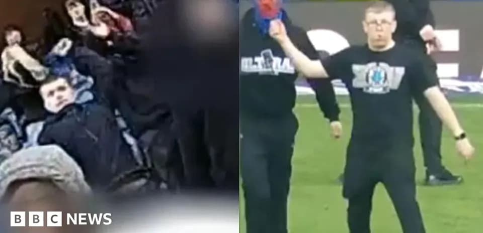 Crowd reacting during a football match incident