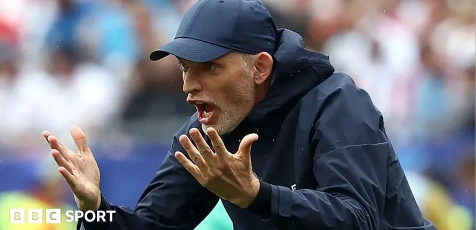 Coach giving instructions on the sidelines during match