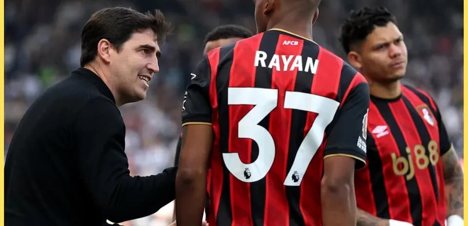 Bournemouth coach discussing strategy with players