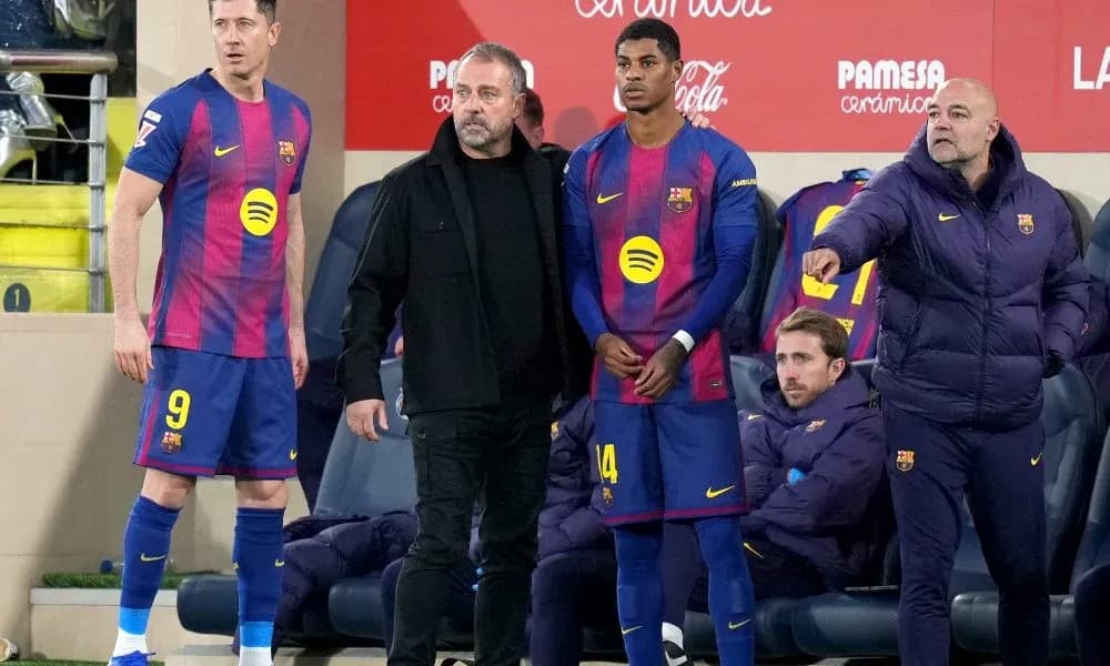 Barcelona players and staff during match substitution